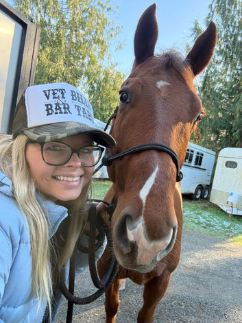 Vet Bills and Bar Tabs Trucker Hat